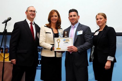 The gentleman holding the certifacte is Mr. Ken Vaughan, Managing Director, CGHB Asia Pacific